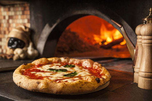 Qual è l'origine della pizza?