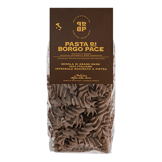 Rustici Integrali - Pasta di semola di grano duro 100% italiano, molito e coltivato in Italia. Trafilatura al bronzo essiccazione lenta a bassa temperatura. Semola di grano duro, acqua. Contiene glutine. Può contenere trace di soia. Tempo medio di conservazione 24 mesi. VALORI NUTRIZIONALI riferiti a 100 g: Energia: 350kcal-1460kj; Carboidrati: 74 g Zuccheri: 2,1 g; Fibre alimentari: 3,4 g; Proteine totali: 12,1 g; Grassi totali: 1, 1g di cui saturi: 0,3 g; Sale: 0,01 g; venduto da Pastificio Alpe della Lu